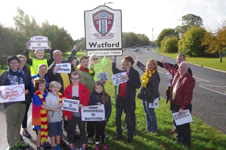 Mass group of pointing Watford Lib Dems