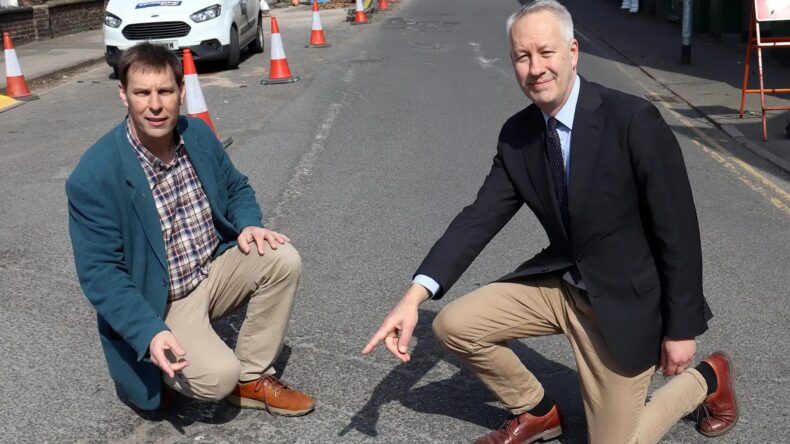 Richard Wilkins and Gideon Amos pointing